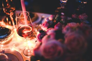 Two Glasses of Wine On Romantic Restaurant Table