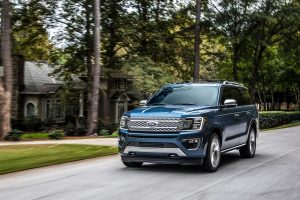 Blue 2020 Ford Expedition Driving Down Street